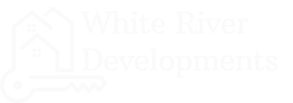 Logo of White River Developments featuring house outline and a key symbol.